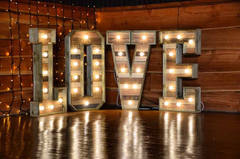 Rustic LOVE Letters at A vow renewal at the Stockfarm Barn Cheshire