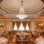 Ceiling chandelier in the Goulburn Suite at Manchester Hall set for a wedding breakfast