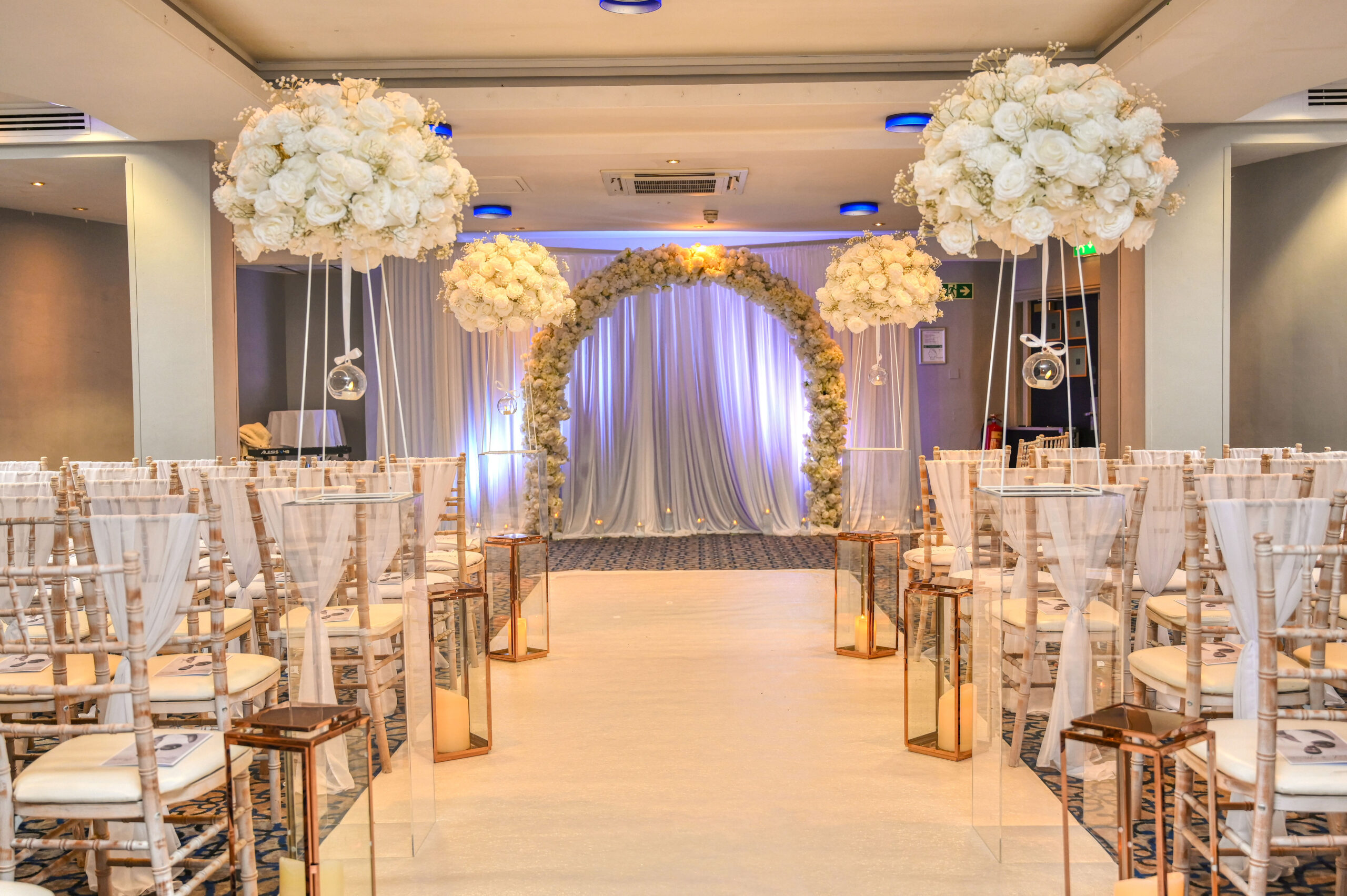 beautifully coordinated floral styling for both their wedding ceremony and reception.